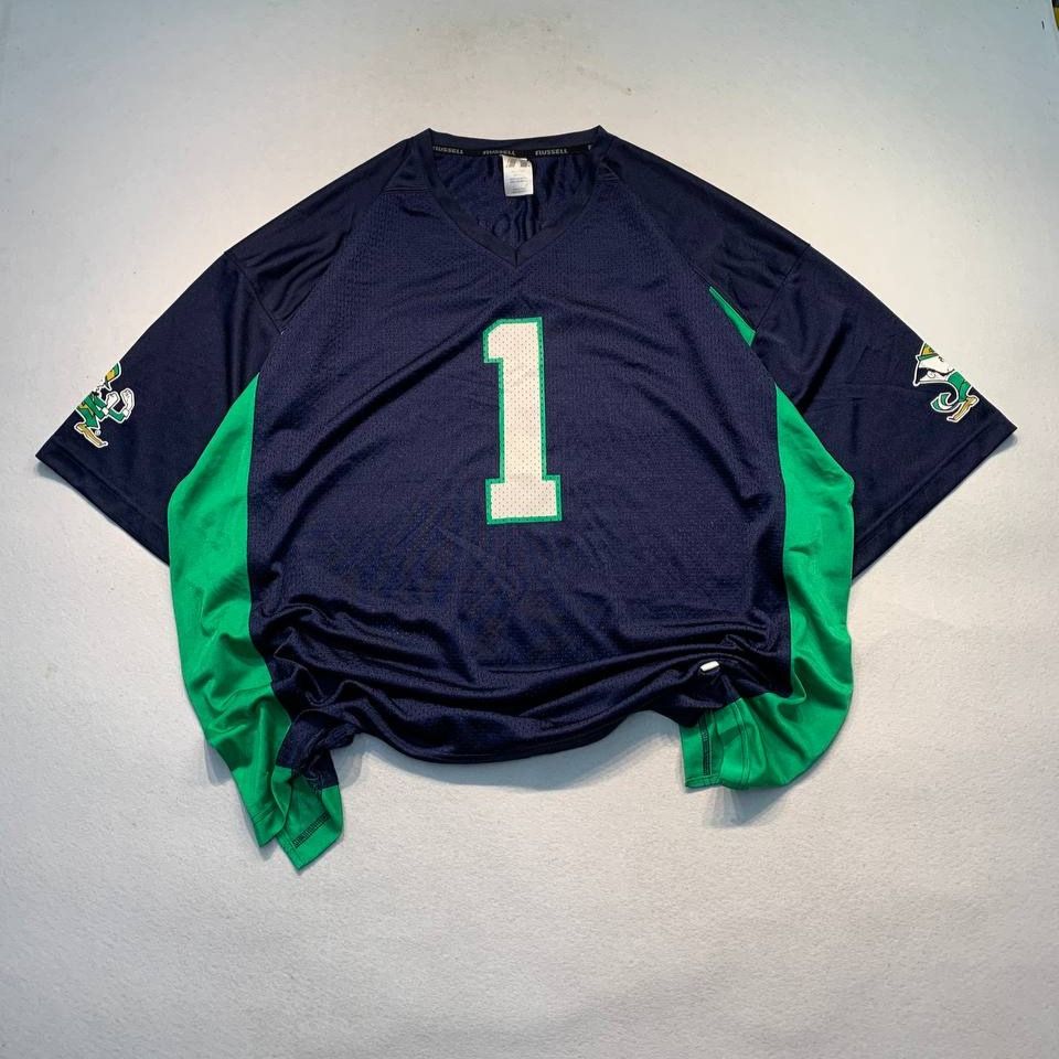 Russell Notre Dame Fighting Irish Jersey (Category: Activewear) located in Mandaluyong City. Submitted by theroom501 (Listing ID 1466685625, Image 1). Description: Russell Notre Dame Fighting Irish Jersey Style Code: Size on Tag: XXL Color: White Condition: Good pre-owned condition with a heavily distressed vintage look. Flaws/Issues: None Flat Lay Measurements: Pit to Pit: 29 inches Length: 32 inches Arm opening Length: 9.5 inches Price: 1000.