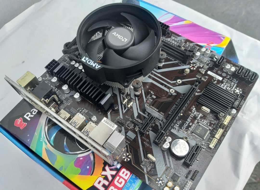 Ryzen5 3500 + GIGABYTE B450M S2H V2 bundle (Category: Computer Parts) located in Caloocan City. Submitted by eselo.co (Listing ID 1466737475, Image 3). Description: Last price posted. Goodvworking. Mint condition. Pickup for testing. GCASH LALAMOVE BUNDLE -Ryzen 5 3500 6-core, 6-thread HSF included -GIGABYTE B450M S3H V2 -------.