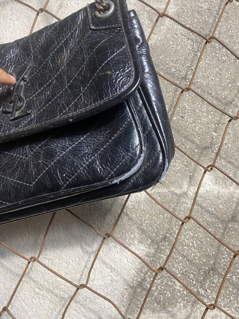 Saint Laurent College Chain Bag Black (Category: Shoulder Bags) located in Cabanatuan. Submitted by adrialesdrip (Listing ID 1466684670, Image 2). Description: - Brand: Saint Laurent - Style: Shoulder Bag / Flap Bag - Material: Black crinkled leather with chevron quilting - Hardware: Dark metal with engraved branding - Closure: Front flap with signature interlocking YSL logo - Details: Chain straps through metal grommets, debossed interior logo -