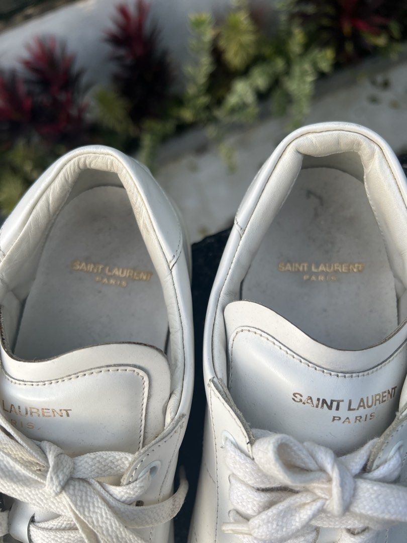 Saint Laurent SL/01 White Leather Sneakers (Category: Sneakers & Footwear) located in Quezon City. Submitted by inigodiago (Listing ID 1466686933, Image 2). Description: Authentic Saint Laurent SL/01 white leather sneakers -no box or bag.