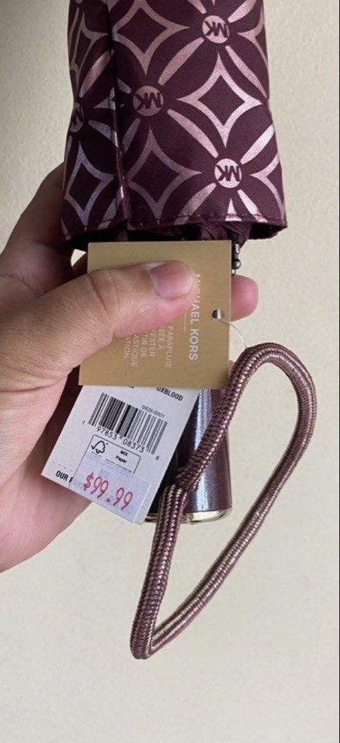 sale!!💯mk umbrella (Category: Luxury Apparel) located in San Luis. Submitted by scarlet012 (Listing ID 1466750154, Image 2). Description: sale!!!!sale!!! 💯original mk umbrella.