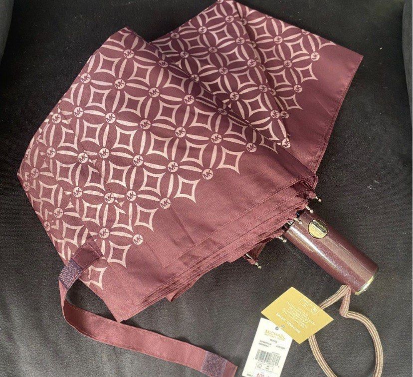 sale!!💯mk umbrella (Category: Luxury Apparel) located in San Luis. Submitted by scarlet012 (Listing ID 1466750154, Image 1). Description: sale!!!!sale!!! 💯original mk umbrella.