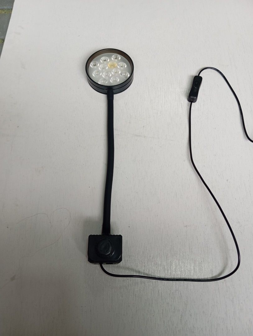 Salt water Aquarium Light (Category: Homes & Other Pet Accessories) located in Caloocan City. Submitted by jonmag31 (Listing ID 1466770120, Image 3). Description: - Flexible gooseneck desk lamp with a round LED head - Features multi-color lighting options (blue, white, and pinkish hues) - Sturdy black clamp base with a convenient rotary control knob - Attached black power cord with an easy-to-use inline toggle switch - Clean overall condition and