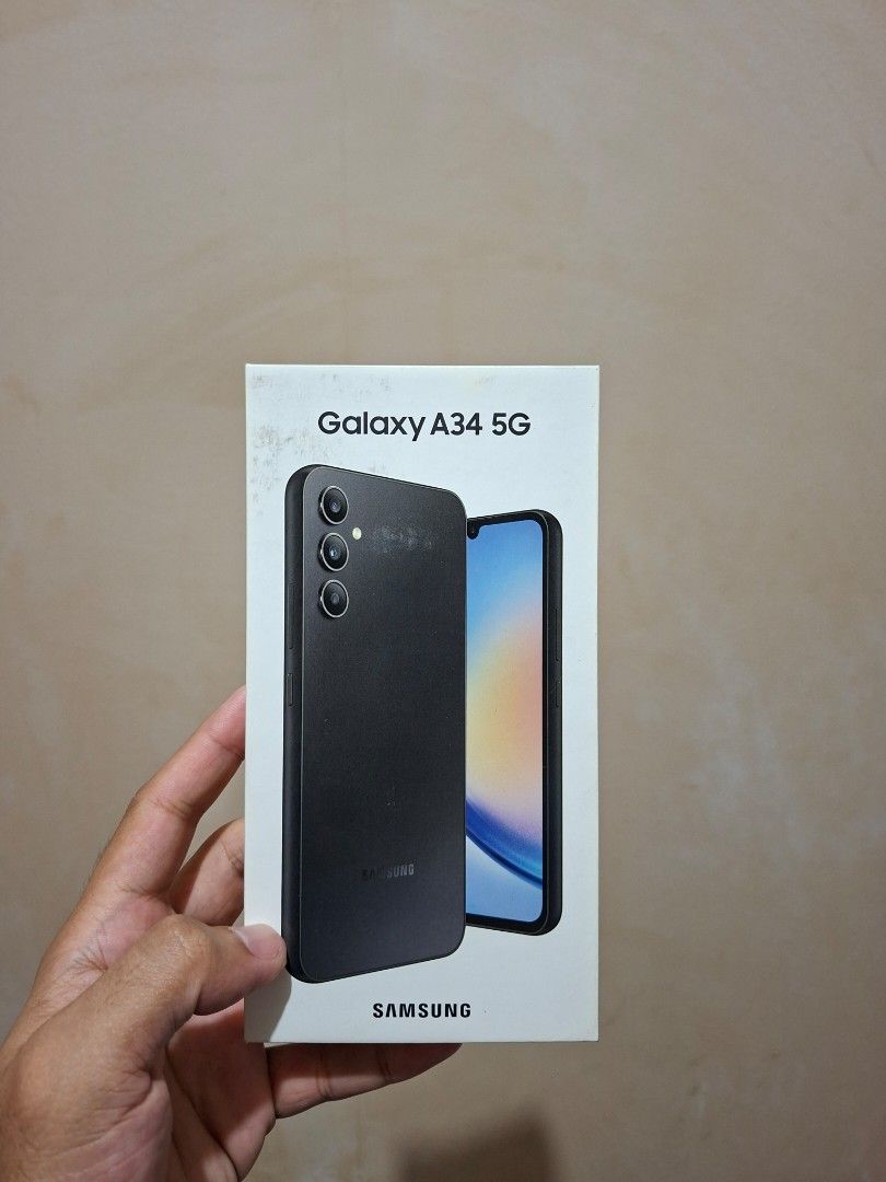 Samsung A34 A5G (Category: Samsung) located in Manila. Submitted by tmac23 (Listing ID 1466770123, Image 1). Description: 8GB RAM / 256 GB ROM Dual Sim Slot (Openline) with shared SD Card slot 5000 mAh battery Up to 120hz Refresh Rate With original charger, original box, multiple case, matte tempered glass and camera tempered glass RFS: Extra phone.