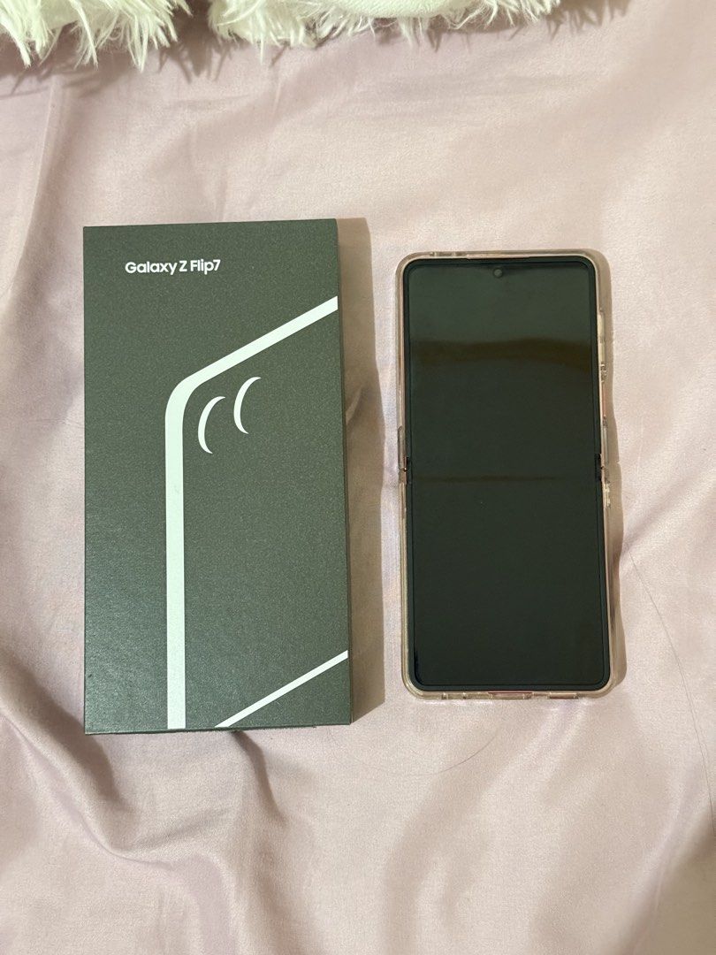 Samsung Galaxy Flip 7 (Category: Samsung) located in Las Pinas. Submitted by smnngale (Listing ID 1466725997, Image 2). Description: ☆ Brand/Model: Samsung Galaxy Z Flip 7 ☆ Storage & RAM: 256GB / 12GB ☆ Color: Coral Red ☆ Condition: Excellent, lightly used / extra phone ☆ Inclusions: Original box, original Type C cable, and clear protective case with magnetic ring ☆ Reason for selling: Decluttering ☆ Mode of Delivery: Meet-up only (SM Mall of As