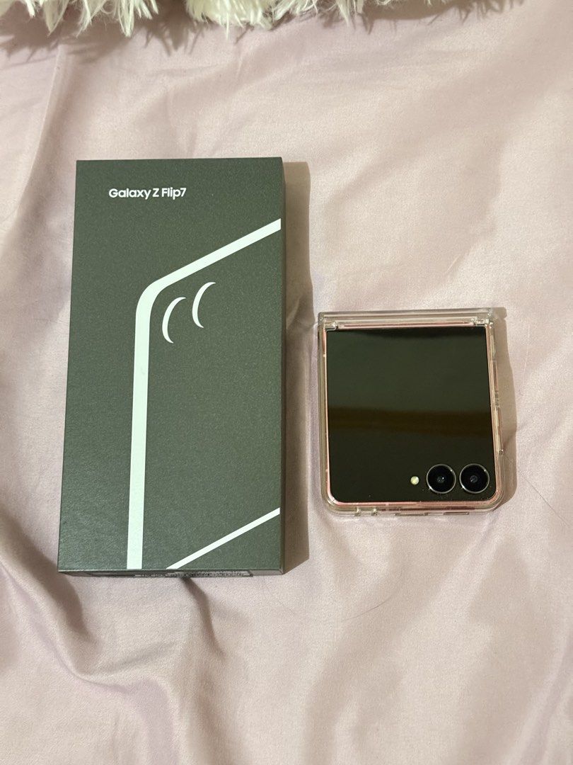 Samsung Galaxy Flip 7 (Category: Samsung) located in Las Pinas. Submitted by smnngale (Listing ID 1466725997, Image 3). Description: ☆ Brand/Model: Samsung Galaxy Z Flip 7 ☆ Storage & RAM: 256GB / 12GB ☆ Color: Coral Red ☆ Condition: Excellent, lightly used / extra phone ☆ Inclusions: Original box, original Type C cable, and clear protective case with magnetic ring ☆ Reason for selling: Decluttering ☆ Mode of Delivery: Meet-up only (SM Mall of As