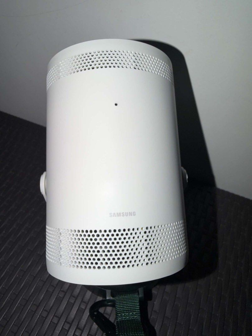 Samsung The Freestyle Projector with Carrying Case (Category: Projectors) located in Minalin. Submitted by asdfgkb (Listing ID 1466601538, Image 2). Description: For sale: Samsung the Freestyle Smart Projector Turn ANY room into your own cinema! 🎬🍿 ✨ Up to 100-inch big screen ✨ Full HD 1080p ✨ Smart TV built-in — stream your favorite content ✨ Auto Focus + Auto Keystone for an easy setup ✨ 180° rotation — project on walls, ceilings, floors and 
