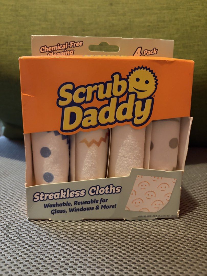Scrub Daddy Streakless Cloths 4 Pack (Category: Cleaning Tools & Supplies) located in Quezon City. Submitted by mmiyah27 (Listing ID 1466654662, Image 1). Description: - Brand: Scrub Daddy - Item: Streakless Cloths (4-pack) - Size: 10 inches x 10 inches each - Features: Chemical-free cleaning for glass and windows - Care: Washable and reusable - Condition: Brand new, unopened box with 4 distinct patterns inside.