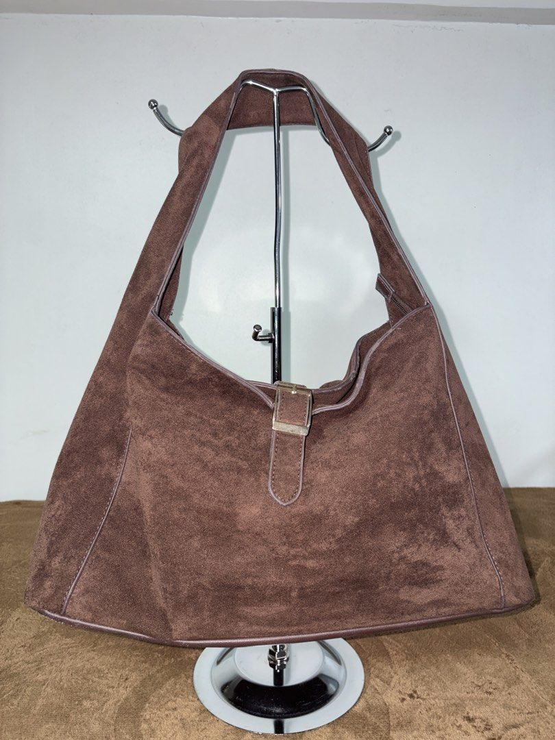 Secosana Brown Suede Shoulder Bag (Category: Shoulder Bags) located in Baguio. Submitted by maje_mori (Listing ID 1466704455, Image 2). Description: - Brand: Secosana - Material: Rich chocolate brown suede with gold-tone hardware - Condition: Excellent suede with minimal signs of use on leather lining (check photos for reference).