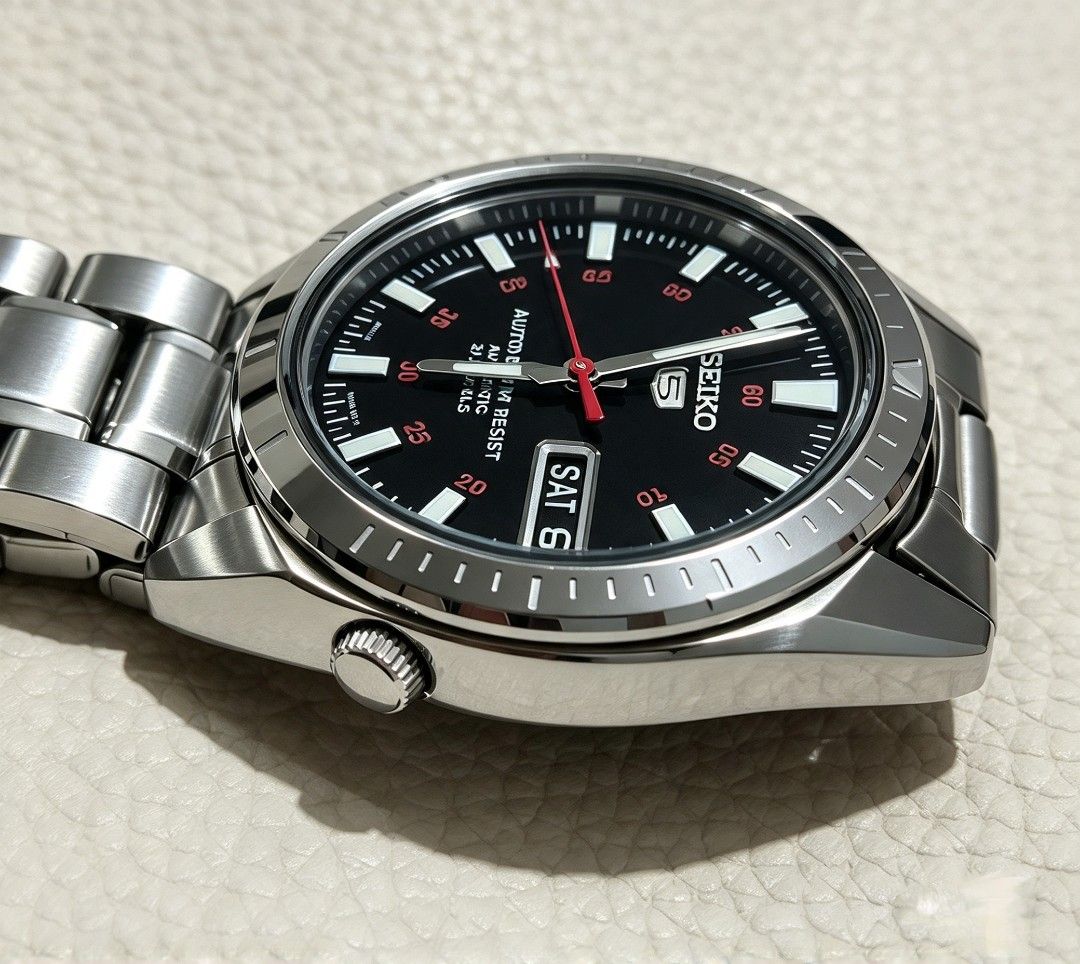 Seiko 5 Automatic Stainless Steel Watch (Category: Men's Watches) located in Caloocan City. Submitted by swiftwater_9c01d6 (Listing ID 1466572253, Image 3). Description: Original Seiko 5 automatic made in japan 7S26-03D0..Luminous glow in the dark.."Day-Date" Seiko 5 automatic watch with a striking black dial and red second hand. Day-date window sits at three o'clock. Stainless steel case paired with matching metal bracelet. Exhibition caseback r