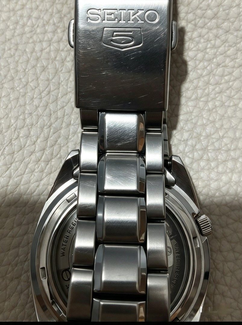 Seiko 5 Automatic Stainless Steel Watch (Category: Men's Watches) located in Caloocan City. Submitted by swiftwater_9c01d6 (Listing ID 1466572253, Image 2). Description: Original Seiko 5 automatic made in japan 7S26-03D0..Luminous glow in the dark.."Day-Date" Seiko 5 automatic watch with a striking black dial and red second hand. Day-date window sits at three o'clock. Stainless steel case paired with matching metal bracelet. Exhibition caseback r