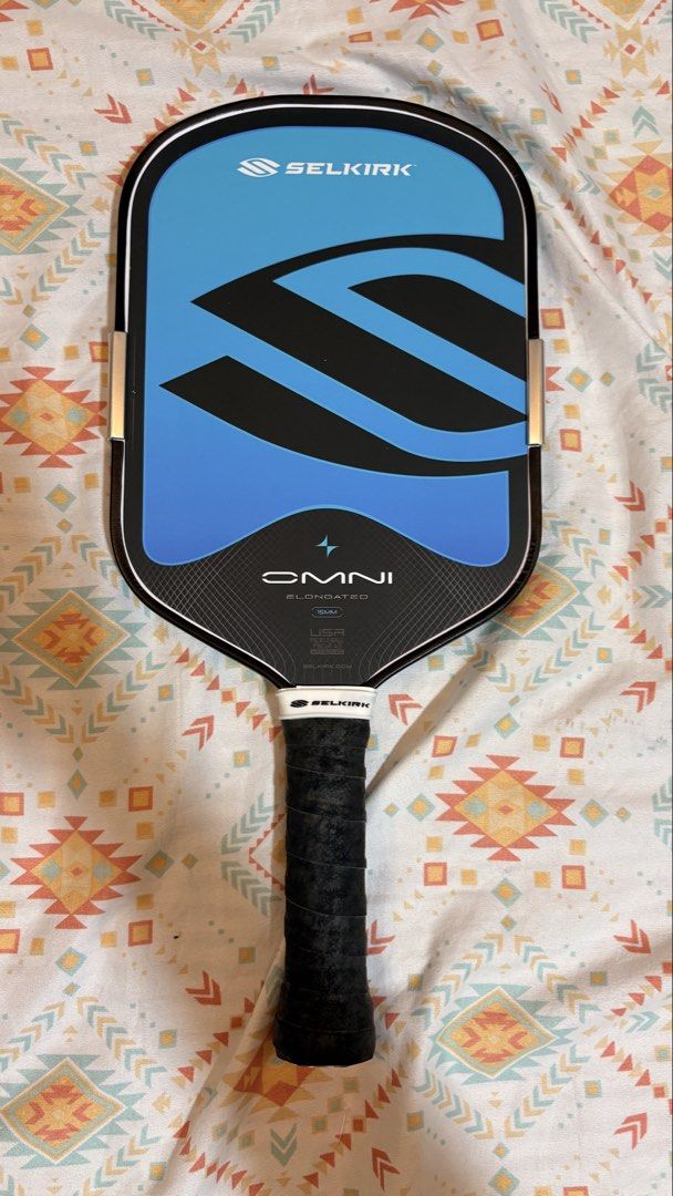 Selkirk Omni (Category: Racket and Ball Sports) located in Manila. Submitted by arch1ves (Listing ID 1466743839, Image 2). Description: Selkirk Omni (hydro) - good as new - 2 weeks old - With original selkirk edge tape and black cookie grip - Nfc scannable (not yet registered) - Bought for 19000, selling for 16500 only - rfs: change paddle, not for me Location: cagayan de oro city, free shipping nationwide.