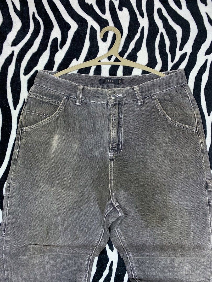 SEMIR CARPENTER JEANS (Category: Jeans) located in Cagayan de Oro. Submitted by yooow.c (Listing ID 1466619237, Image 3). Description: W: 34 L: 39.5 THIGH: 15 HEM: 9 - good condition - have stain on pic but i already washed - hard black denim - slight heavy - minor loose stitch on hem.