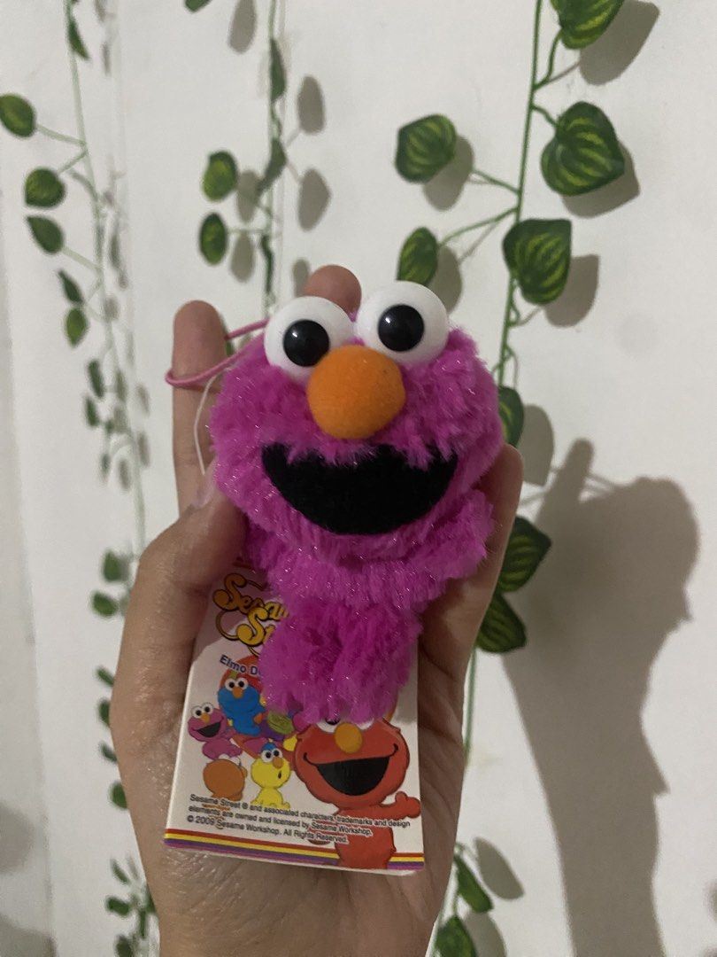 Sesame Street Elmo Plush Charm (Category: Plushies & Soft Toys) located in Guagua. Submitted by toy_corner (Listing ID 1466713706, Image 2). Description: Brand new with papertag NO ISSUE Hard eye Pampanga loc MOP: Gcash J&t courier.