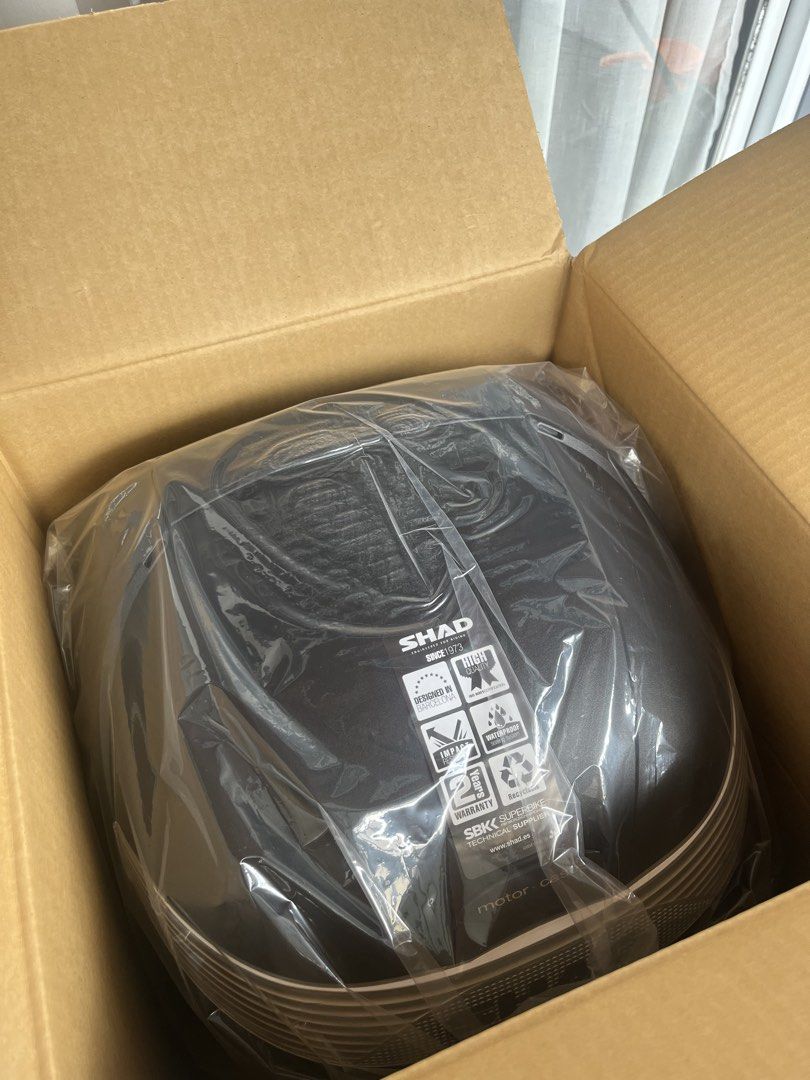 SHAD SH29 Motorcycle Top Case Storage Box (Category: Looking For) located in Paranaque City. Submitted by midnightsky777 (Listing ID 1466595777, Image 2). Description: - Brand new, unused SHAD SH29 motorcycle top case in sleek black - Spacious storage designed to safely hold helmets and essential riding gear - Features built-in waterproof sealing and tough, impact-resistant materials - Complete with original cardboard packaging and inner protecti
