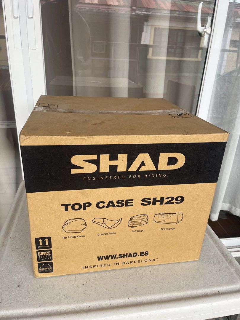 SHAD SH29 Motorcycle Top Case Storage Box (Category: Looking For) located in Paranaque City. Submitted by midnightsky777 (Listing ID 1466595777, Image 3). Description: - Brand new, unused SHAD SH29 motorcycle top case in sleek black - Spacious storage designed to safely hold helmets and essential riding gear - Features built-in waterproof sealing and tough, impact-resistant materials - Complete with original cardboard packaging and inner protecti