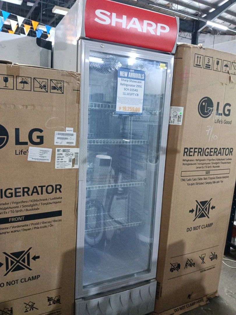 Sharp Showcase Refrigerator 295L SCH-315AS 11.1CUFT (Category: Refrigerators and Freezers) located in Manila. Submitted by jesicahmrsantarosa (Listing ID 1466600017, Image 1). Description: Sharp showcase glass door refrigerator. Model SCH-315AS, 295 liters capacity, 11.1 cubic feet. Multiple wire shelves inside for organization. Clear glass front for easy viewing of contents. Red top branding panel. Great for drinks, retail setups, or extra stora