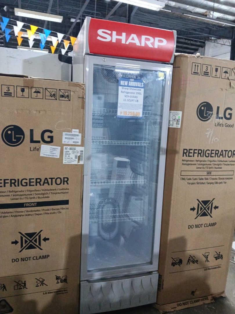 Sharp Showcase Refrigerator 295L SCH-315AS 11.1CUFT (Category: Refrigerators and Freezers) located in Manila. Submitted by jesicahmrsantarosa (Listing ID 1466600017, Image 3). Description: Sharp showcase glass door refrigerator. Model SCH-315AS, 295 liters capacity, 11.1 cubic feet. Multiple wire shelves inside for organization. Clear glass front for easy viewing of contents. Red top branding panel. Great for drinks, retail setups, or extra stora