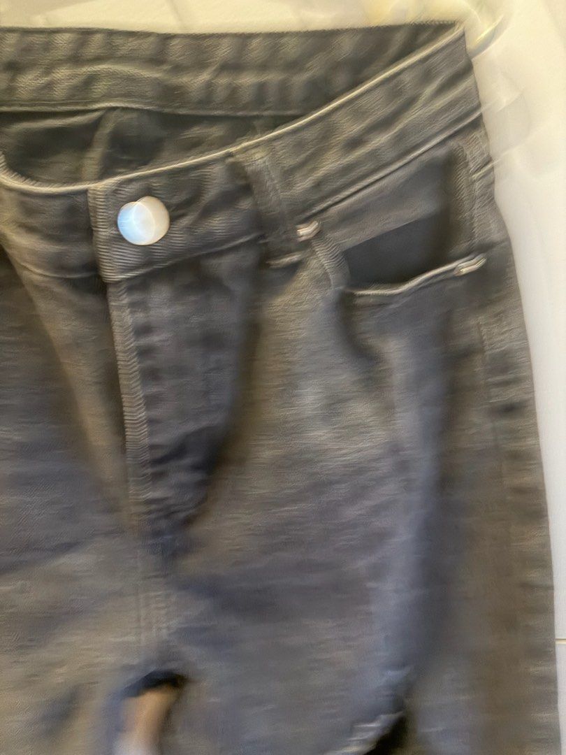 SHEIN Distressed Black Denim Jeans Size M (Category: Jeans) located in Quezon City. Submitted by bubspreloved (Listing ID 1466721154, Image 2). Description: - Brand: Shein - Size: Medium (Brand new with tag attached) - Color: Black wash - Rise: Mid-rise fit - Details: Ripped knees and trendy raw rolled cuffs - Closure: Standard button and zip fly - Pockets: Classic five-pocket design.
