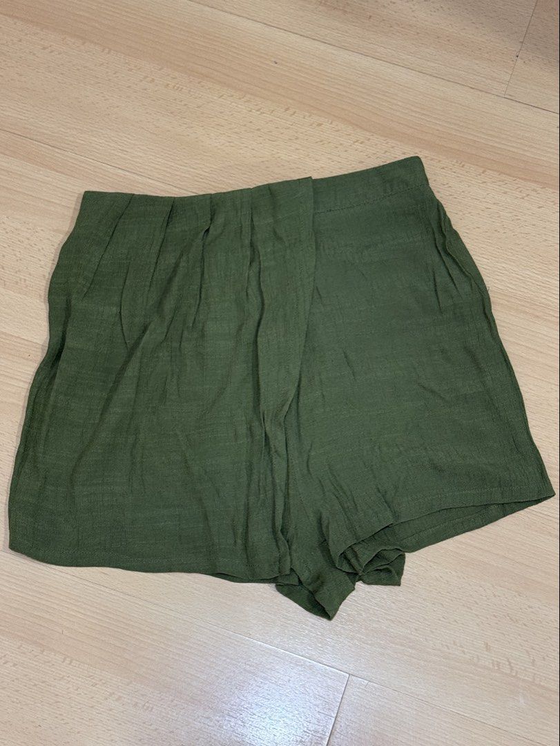 SHEIN Olive Green Overlap Skort (Category: Shorts) located in Muntinlupa City. Submitted by alexisofia (Listing ID 1466767712, Image 1). Description: like new, worn a few times only / excellent condition size: Medium (EU 38 / US 6) Brand SHEIN.