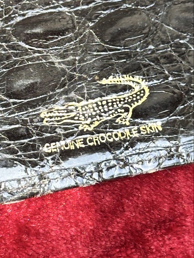 Shiny Niloticus crocodile black wallet. (Category: Wallets & Card Holders) located in Cagayan de Oro. Submitted by kjcartier26 (Listing ID 1466616772, Image 3). Description: Authentic Crocodile Leather. 🇯🇵 - High quality, signs of use only. - Has many card holder, Good for longtime use..
