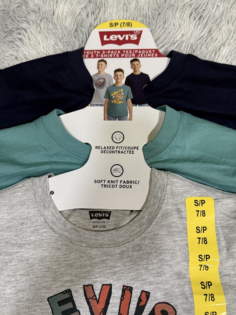 Shirt for Kids (Category: Babies & Kids Fashion) located in Muntinlupa City. Submitted by avampaya (Listing ID 1466688343, Image 3). Description: Youth 3-pack t-shirts from Levi's 3 colors: grey with dirt bike graphic, green, and navy blue. Size S, fits ages 7 to 8 years old. .