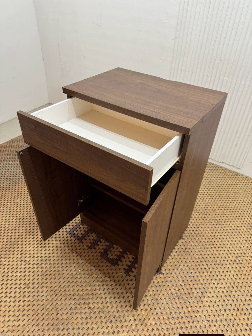 Side Drawer (Category: Shelves, Cabinets & Racks) located in Meycauayan. Submitted by marygracecasimiro (Listing ID 1466773574, Image 2). Description: Wooden 2-Door and Drawer Side Cabinet Price: 5,200 L23 x W16 x H35 In good condition🩷.