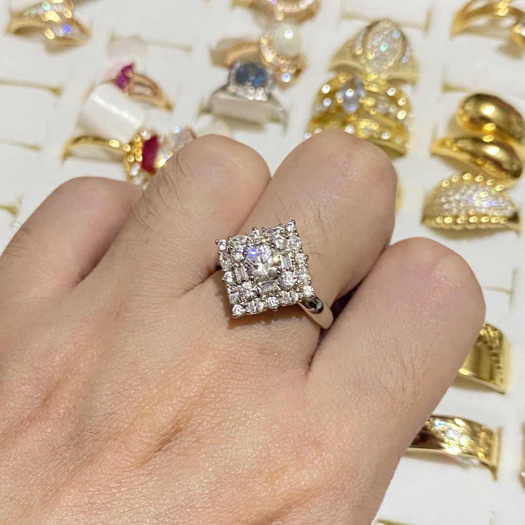 Silver-toned statement ring with cubic zirconia crystals (Category: Rings) located in Davao. Submitted by alessuh (Listing ID 1466678115, Image 3). Description: - Silver-toned statement ring with a polished finish - Large round central stone in an intricate cluster design - Surrounded by sparkling smaller round and baguette cubic zirconia crystals - Excellent clean condition with no missing stones - Perfect for parties, events, or everyday glam.