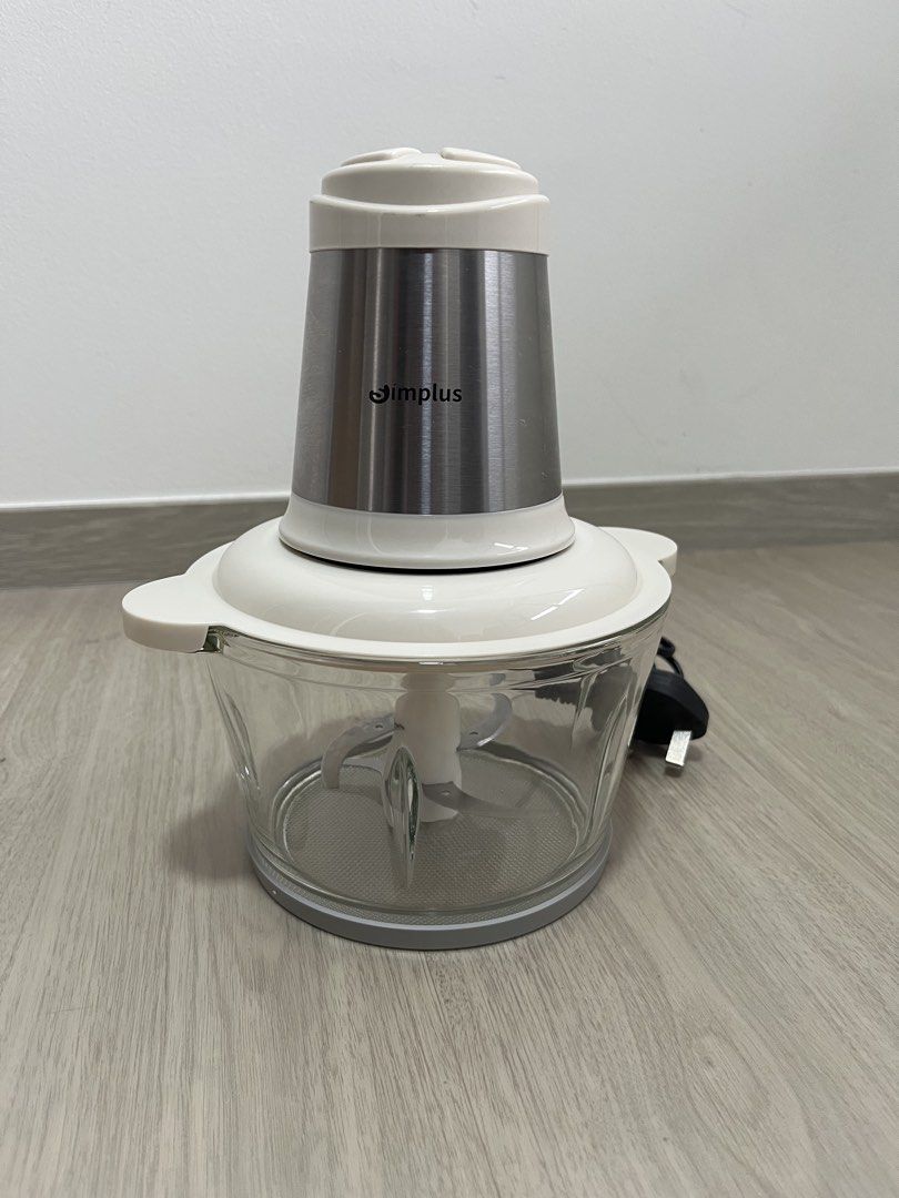 Simplus Food Processor (Category: Juicers, Blenders & Grinders) located in Singapore. Submitted by rit.dz (Listing ID 1466686836, Image 1). Description: - Capacity: 1.8L - Glass Bowl with Stainless Steel Blades - Outer Shell: Stainless Steel - Two speed model with 4 blades - Power: 300W .