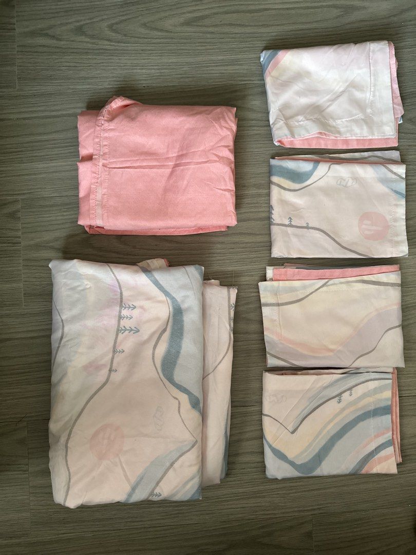 Feel At Home Bedding Set | Pastel Abstract Mountain Landscape Pattern (Category: Bedding & Towels) located in Mandaluyong City. Submitted by deerselu (Listing ID 1466602869, Image 1). Description: Set Includes: - 1x Fitted Sheet (Plain coral pink) - not garterized - 1x Blanket (Patterned) - 4pcs pillow sheet - Single size.
