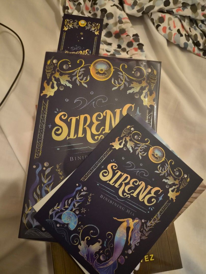 Sirene by Binibining Mia (Signed, new version) Wattpad Book (Category: Storybooks) located in Manila. Submitted by calcifie (Listing ID 1466690552, Image 1). Description: Unsealed with complete inclusions. With plastic jacket. Posted = Available. Prices are firm unless you get more than 1 item. MOP: GCash, BPI Transfer, Wise (+5% transaction fee c/o buyer) MOD: LBC, Gogo Express, J&T Same Day delivery at buyers expense.