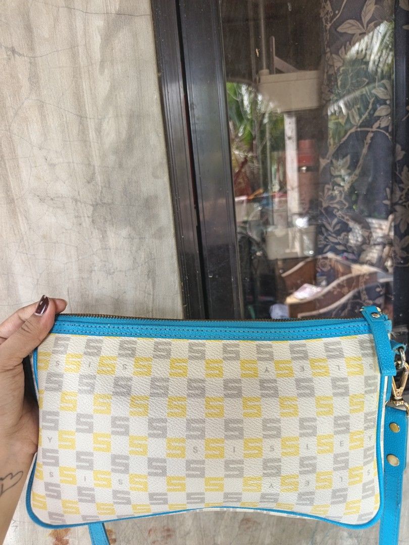 Sisley sling bag (Category: Cross-body Bags) located in Quezon, Isabela. Submitted by ukay-ukaybylyn (Listing ID 1466573999, Image 2). Description: flaws sa loob madumi kita naman sa picture need palinis.