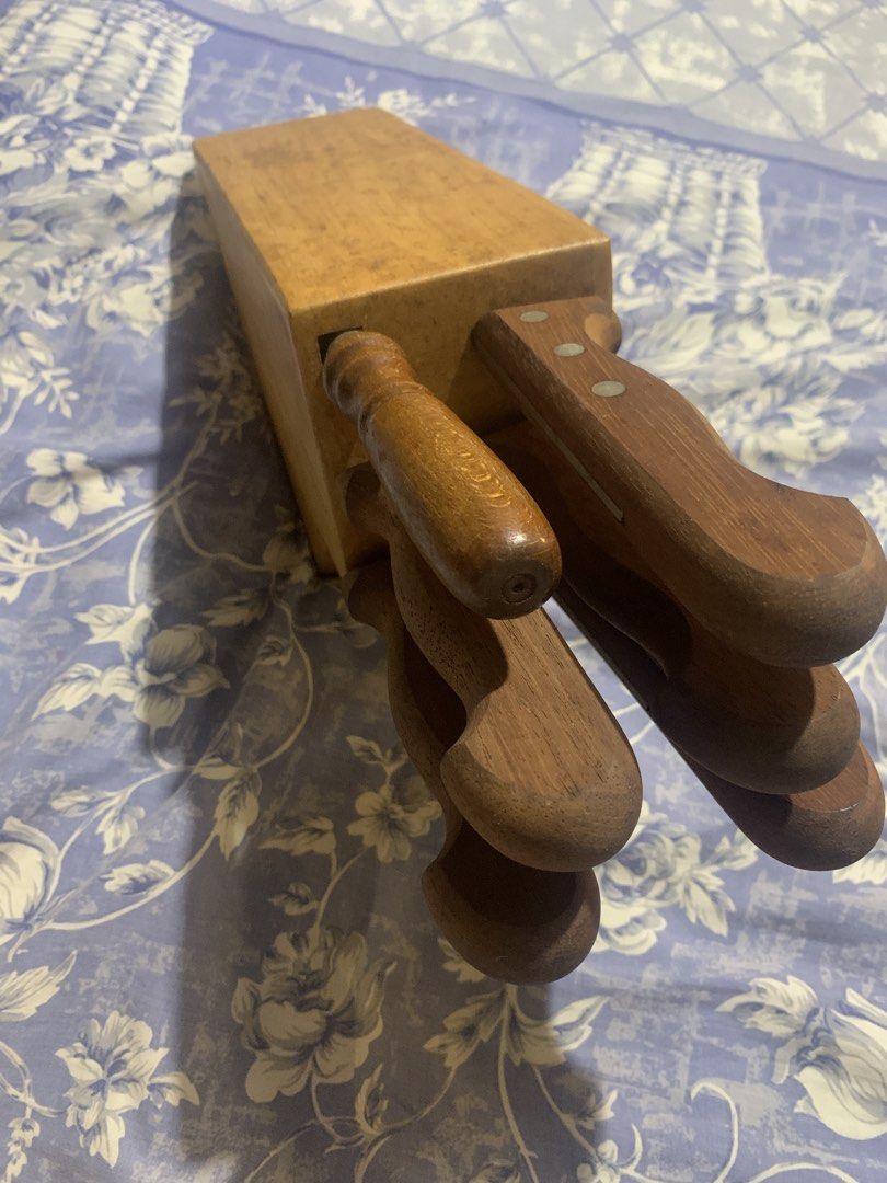 Solingen Wooden Knife with stand (Category: Knives & Chopping Boards) located in Manila. Submitted by vrsd1027 (Listing ID 1466697025, Image 1). Description: - Complete set: Includes a solid wooden knife block, several kitchen knives, and a sharpener rod - Premium quality: Features genuine steel blades marked Solingen Germany - Durable build: Classic wooden handles securely fastened with rivets - Authentic character: Blades show natural patina, s