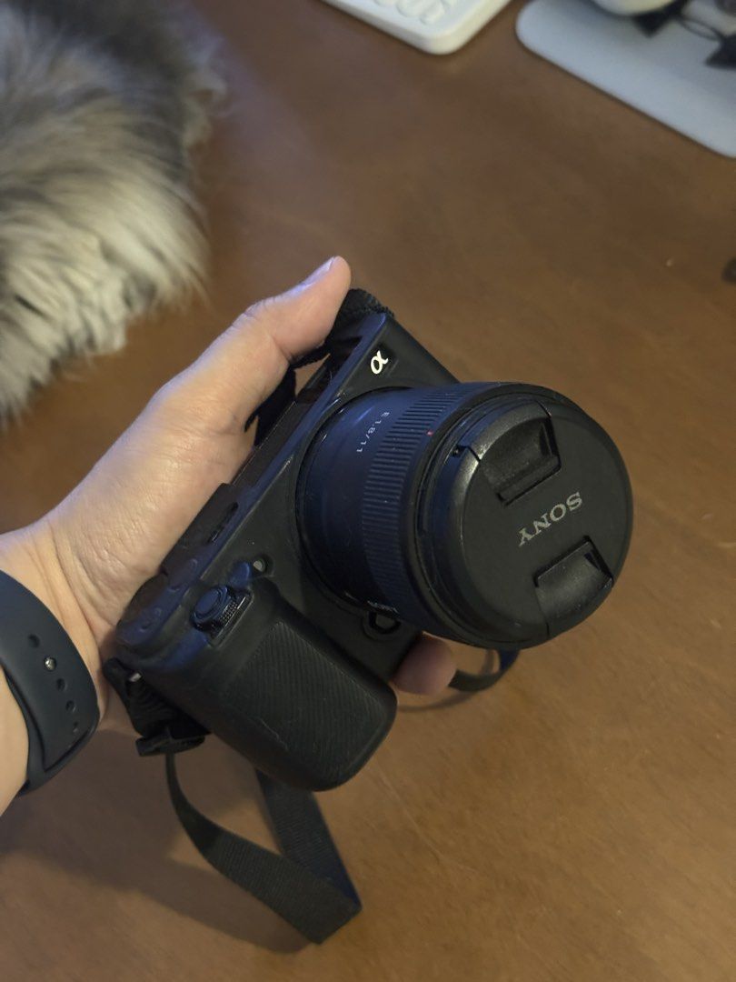 Sony Alpha ZV-E10 Mirrorless Camera with E 1.8/11 Lens (Category: Cameras) located in Del Monte. Submitted by jccabunag (Listing ID 1466580001, Image 1). Description: - Sony mirrorless camera setup - Includes E 1.8/11 lens - Comes with black silicone protective body case and black neck strap - Fully functional LCD screen - Compact and lightweight design - Ideal for content creation, vlogging, and everyday photography.