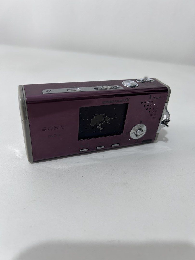 Sony Cyber-shot DSC-L1 Compact Digital Camera (Category: Cameras) located in Cainta. Submitted by mimidiva (Listing ID 1466703689, Image 3). Description: Sony Cyber-shot DSC-L1 Compact Digital Camera Color: wine red / maroon finish Resolution: 4.1 Megapixels Inclusion: power adapter and cables ****RFS: defective/faulty unit sold “as-is” for parts or memorabilia/collection Cainta Location.