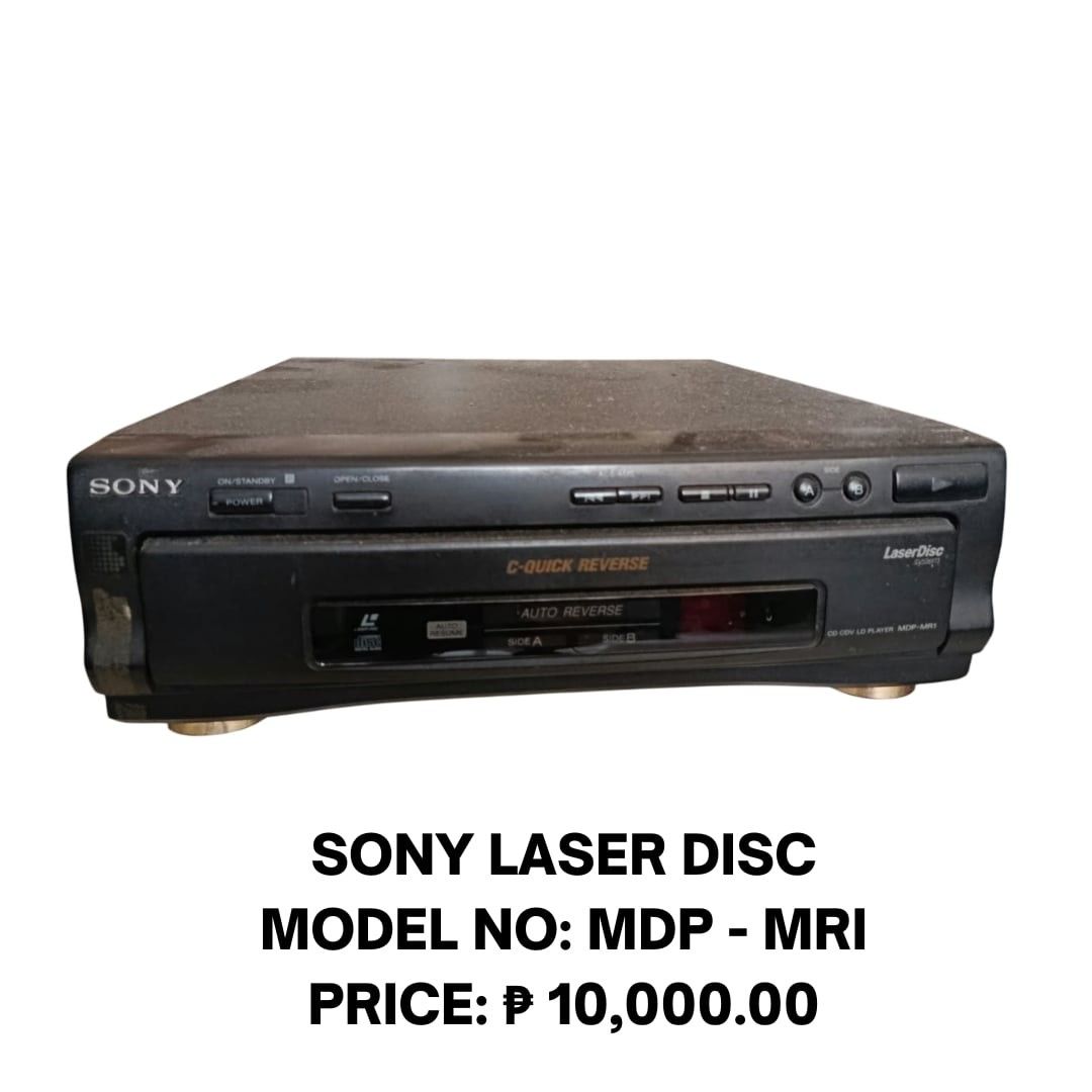 Sony Laser Disc Model No: MDP-MR1 (Negros Oriental only) (Category: Blu-Ray & Media Players) located in Manila. Submitted by jjwebshop2026 (Listing ID 1466569618, Image 1). Description: - Model: Sony MDP-MR1 LaserDisc Player - Color: Classic black casing - Features: C-Quick Reverse and front panel controls (Power, Open/Close, Side A/B, Play, Pause, Skip) - Condition: Heavy dust accumulation and wear marks on the top surface and edges.