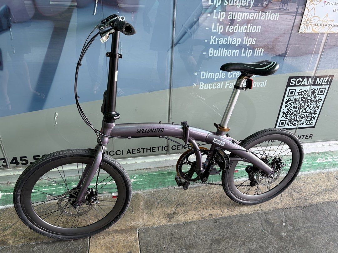 Specialized Folding Bicycle Purple Disk Brake (Category: Bicycles) located in Pasig City. Submitted by preloved_items_roche (Listing ID 1466701030, Image 2). Description: - Eye-catching glossy purple finish - Front and rear disc brakes for reliable stopping power - Stylish deep section wheels - Adjustable seat post and folding handlebar stem for easy storage and transport - Clean single chainring setup with protective chain guard - Comfortable bl