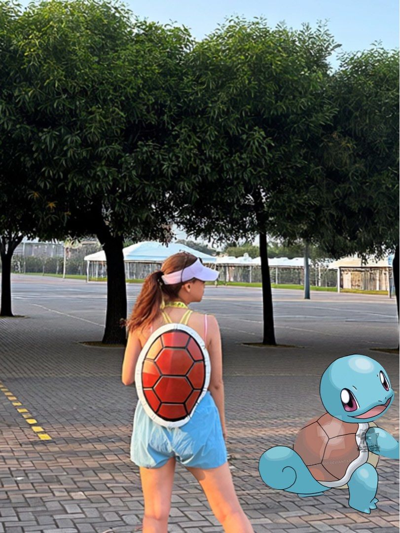 Squirtle turtle shell cosplay prop costume accessory (Category: Character Goods) located in Quezon City. Submitted by edfghjklnncpl (Listing ID 1466623021, Image 3). Description: Handmade turtle shell prop, great for Squirtle cosplay or Pokémon costumes. Red hexagonal plates with black borders and a white rim. Worn once for a photoshoot, fits comfortably on the back with straps attached. Lightweight and sturdy build. Ready for your next conventio