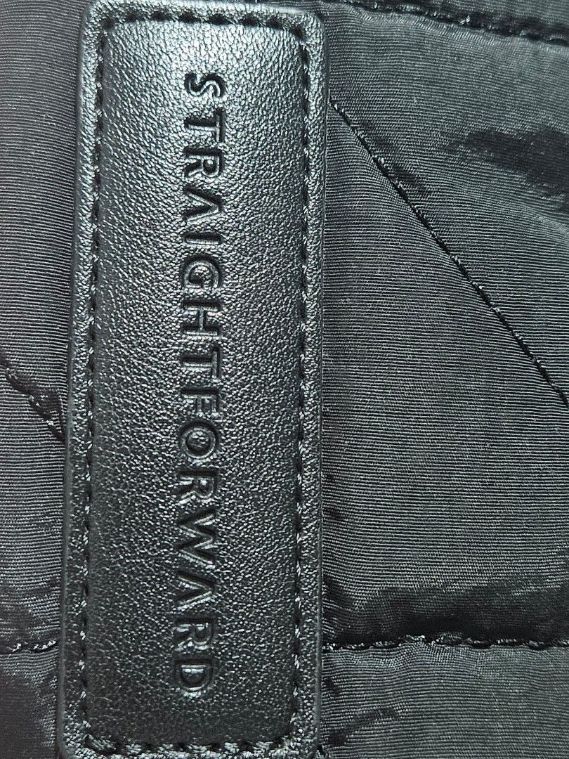Straightforward Black Quilted Tote Bag (Category: Tote Bags) located in Manila. Submitted by snugglebug04 (Listing ID 1466648406, Image 3). Description: - Brand: Straightforward - Color: Classic Black - Design: Puffer style with structured grid stitching - Straps: Dual shoulder straps for comfortable carrying - Details: Front patch label with debossed brand logo - Storage: Deep main compartment, perfect for daily essentials, books, or a tablet - 