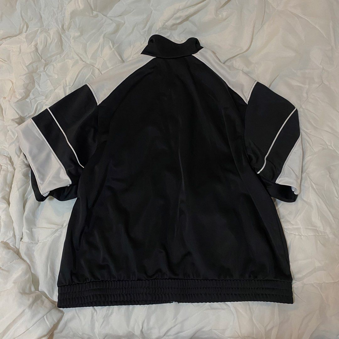 Streetwear Oversized Black Tracksuit Jacket (Category: Coats, Jackets and Outerwear) located in Manila. Submitted by sugarcane888 (Listing ID 1466707680, Image 3). Description: ⭐️ H&M - Retro Oversized Black Tracksuit Jacket 📌 Fits S - M 📌 High Neck Zip Up 📌 In good condition.