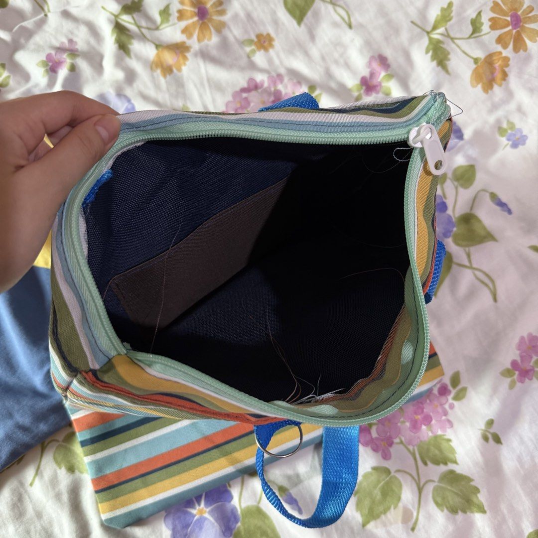 Striped Blue Tote Bag (Category: Tote Bags) located in Pasig City. Submitted by beabimbop (Listing ID 1461165119, Image 2). Description: • last price! i have more tote bags too if interested isabay. just pm • minor issue: loose threads • rfs: di nagagamit 🏷️ tags: beach bag, hobo bag, frutiger aero bag, heisei retro bag, japan bag, tote bag bundle.