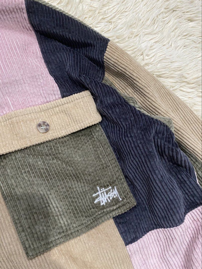 Stüssy Patchwork Corduroy Jacket Full Zip (Category: Coats, Jackets and Outerwear) located in Antipolo. Submitted by switchneighborhood (Listing ID 1466621601, Image 2). Description: - Brand: Stüssy - Style: Patchwork corduroy jacket in muted earth tones and pink - Closure: Full zip with custom 'Stüssy International Tribe' ring pull - Pockets: Two front chest pockets with button flaps and embroidered logo on the left - Details: Classic collar, ri