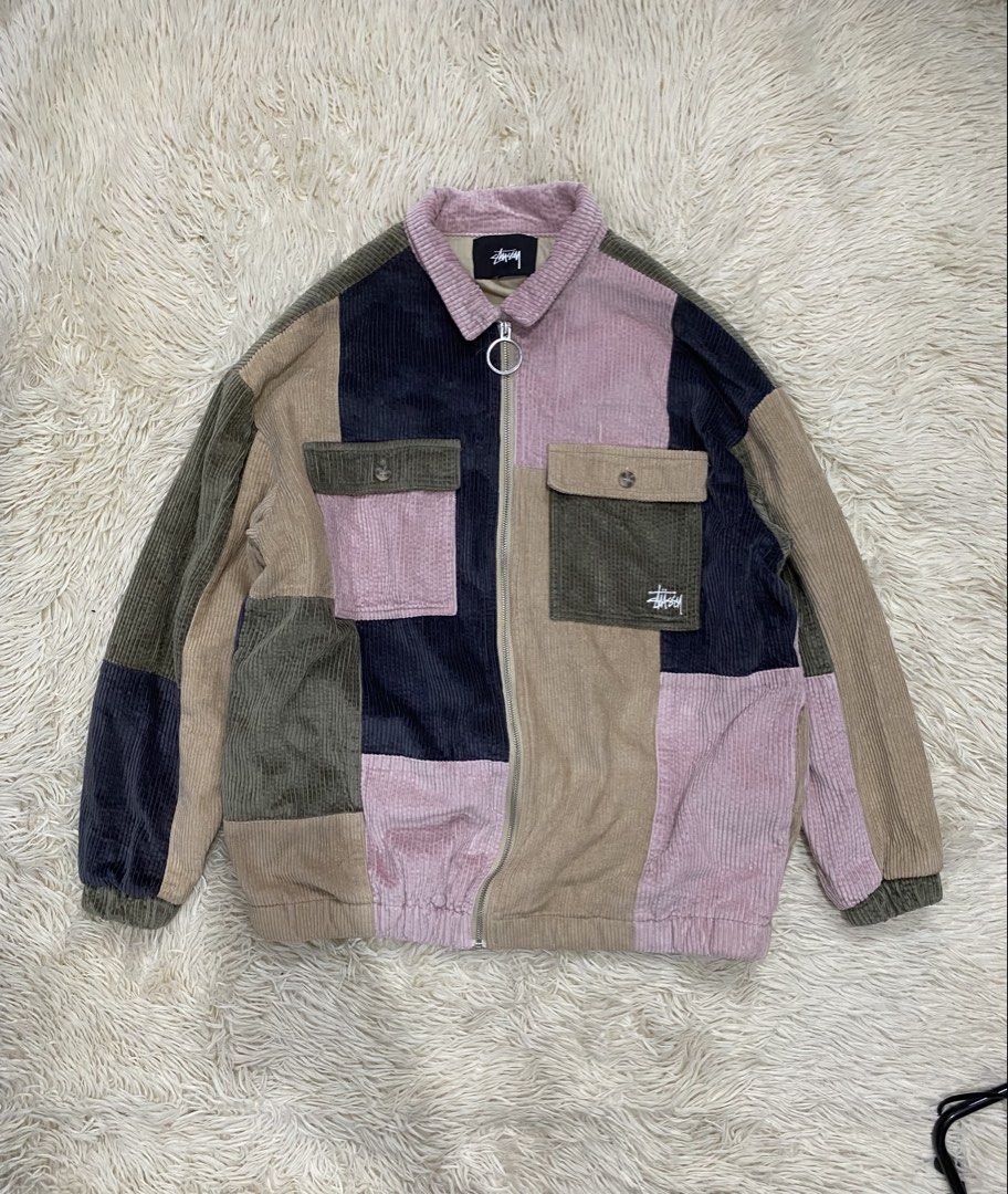 Stüssy Patchwork Corduroy Jacket Full Zip (Category: Coats, Jackets and Outerwear) located in Antipolo. Submitted by switchneighborhood (Listing ID 1466621601, Image 1). Description: - Brand: Stüssy - Style: Patchwork corduroy jacket in muted earth tones and pink - Closure: Full zip with custom 'Stüssy International Tribe' ring pull - Pockets: Two front chest pockets with button flaps and embroidered logo on the left - Details: Classic collar, ri