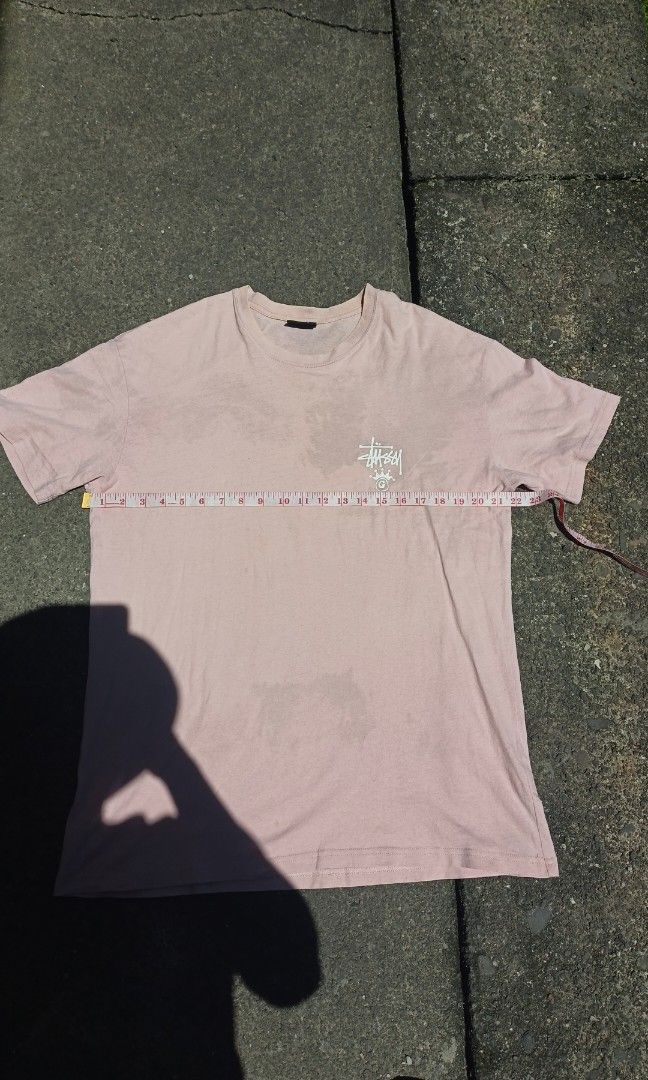 Stüssy Tee, Washed Pink, Crown Back Print (Category: Activewear) located in Canlaon. Submitted by thriftytrift (Listing ID 1466597031, Image 2). Description: The faded pink look comes from the wash, so it may look slightly different in person. Dimes:22/30 condition:8/10 cr:8/10.