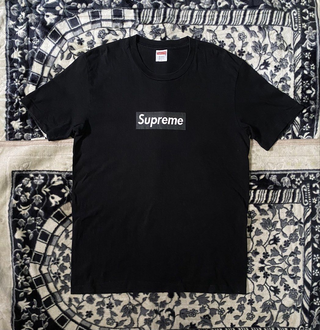 Supreme Black Box Logo T-Shirt (Category: Tshirts & Polo Shirts ) located in Sebaste. Submitted by phak.thrifts (Listing ID 1466681551, Image 1). Description: - Authentic Black Supreme box logo tee - Classic short sleeves and crew neck design - Iconic white Supreme box logo on the chest - Neck tag intact showing clear branding and size - Versatile streetwear piece, easy to style with jeans, shorts, or cargo pants.