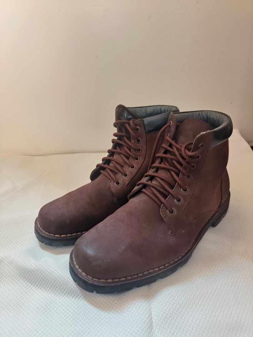 Swatch Seasider Brown Leather Boots (Category: Boots) located in Quezon City. Submitted by closetraiders.mnl (Listing ID 1466707354, Image 1). Description: - Brand: Swatch Sensider (Made in Marikina) - Size: 7.0M - Material: Genuine Brown leather - Style: Classic lace-up with sturdy construction and comfortable ankle height - Flaws: Cracking/peeling on the black padded collar, especially around the opening..