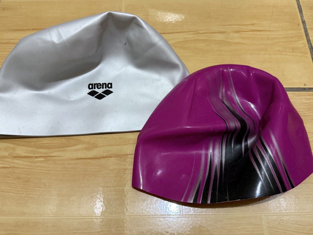 Swim cap (Category: Bikinis & Swimsuits) located in Binan City. Submitted by abckidsxyz (Listing ID 1466586278, Image 2). Description: Original arena and speedo swim cap. Never used. Not packaging and opened already. Ayaw po ng anak ko. .