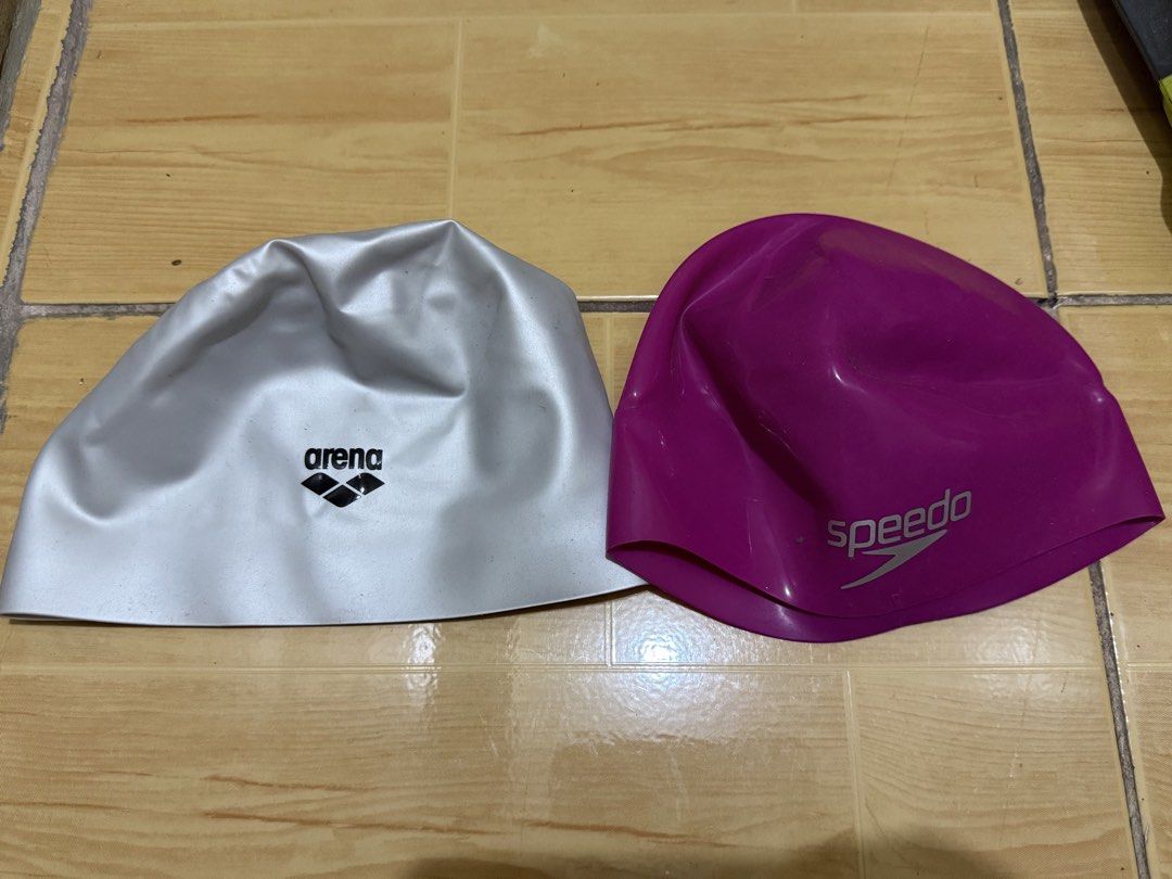 Swim cap (Category: Bikinis & Swimsuits) located in Binan City. Submitted by abckidsxyz (Listing ID 1466586278, Image 1). Description: Original arena and speedo swim cap. Never used. Not packaging and opened already. Ayaw po ng anak ko. .