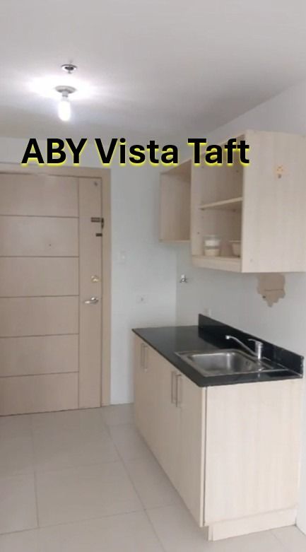Taft Condominium Unit (La Salle) (Category: Apartments & Condos) located in Manila. Submitted by aby.aby1 (Listing ID 1466573301, Image 3). Description: - Location: De La Salle University Manila - Condo is JUST BESIDE LRT1 - Vito Cruz Station - Kitchen: Equipped with built-in cabinets and sink - Flooring: Fully tiled throughout - Interior: Clean walls, installed doors, and windows with great natural light and views - Bare Studio Unit - Tenants wi