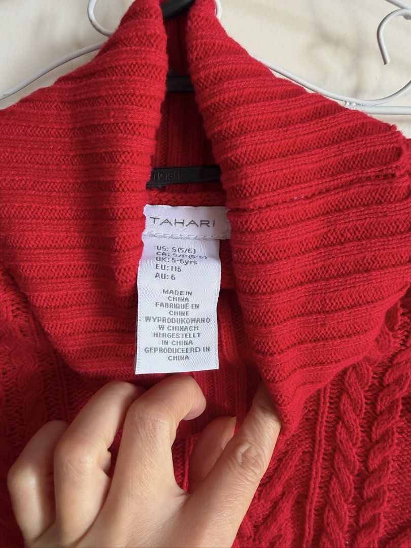 Tahari Red Turtleneck Cable Knit Sweater Size S (Category: Babies & Kids Fashion) located in Quezon City. Submitted by bubspreloved (Listing ID 1466770952, Image 3). Description: - Brand/Style: Bright red Tahari turtleneck sweater - Size: US S (5/6) - Design: Chunky cable knit on front and sleeves, smooth knit on back - Details: Rolled collar and ribbed hem - Condition/Origin: Made in China - Styling: Perfect cozy winter piece, easily pairs with 